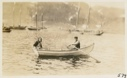 Image of Capt. Gilbert's daughter and boy in row boat